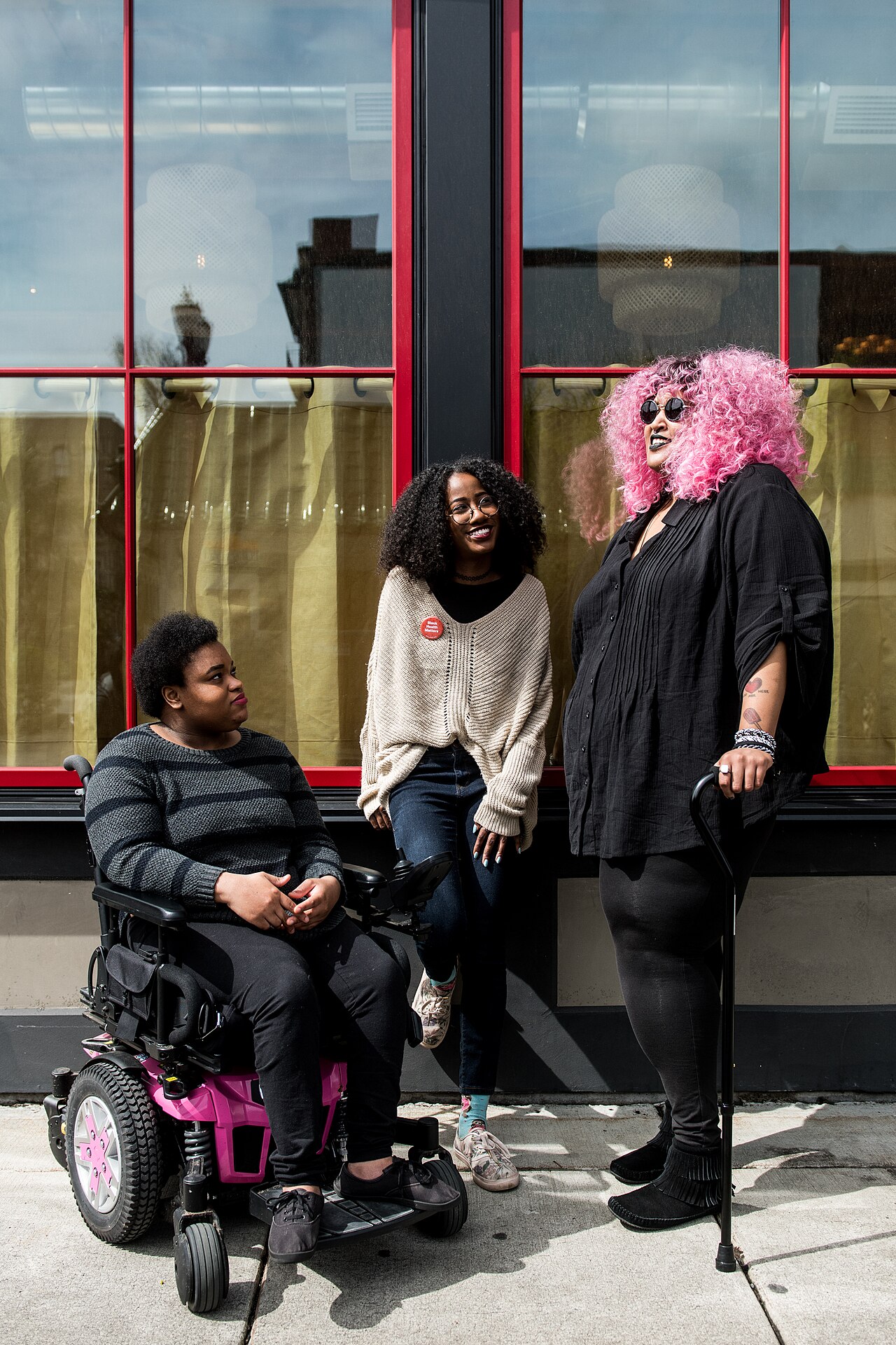Disabled participants socialising outdoors in the community