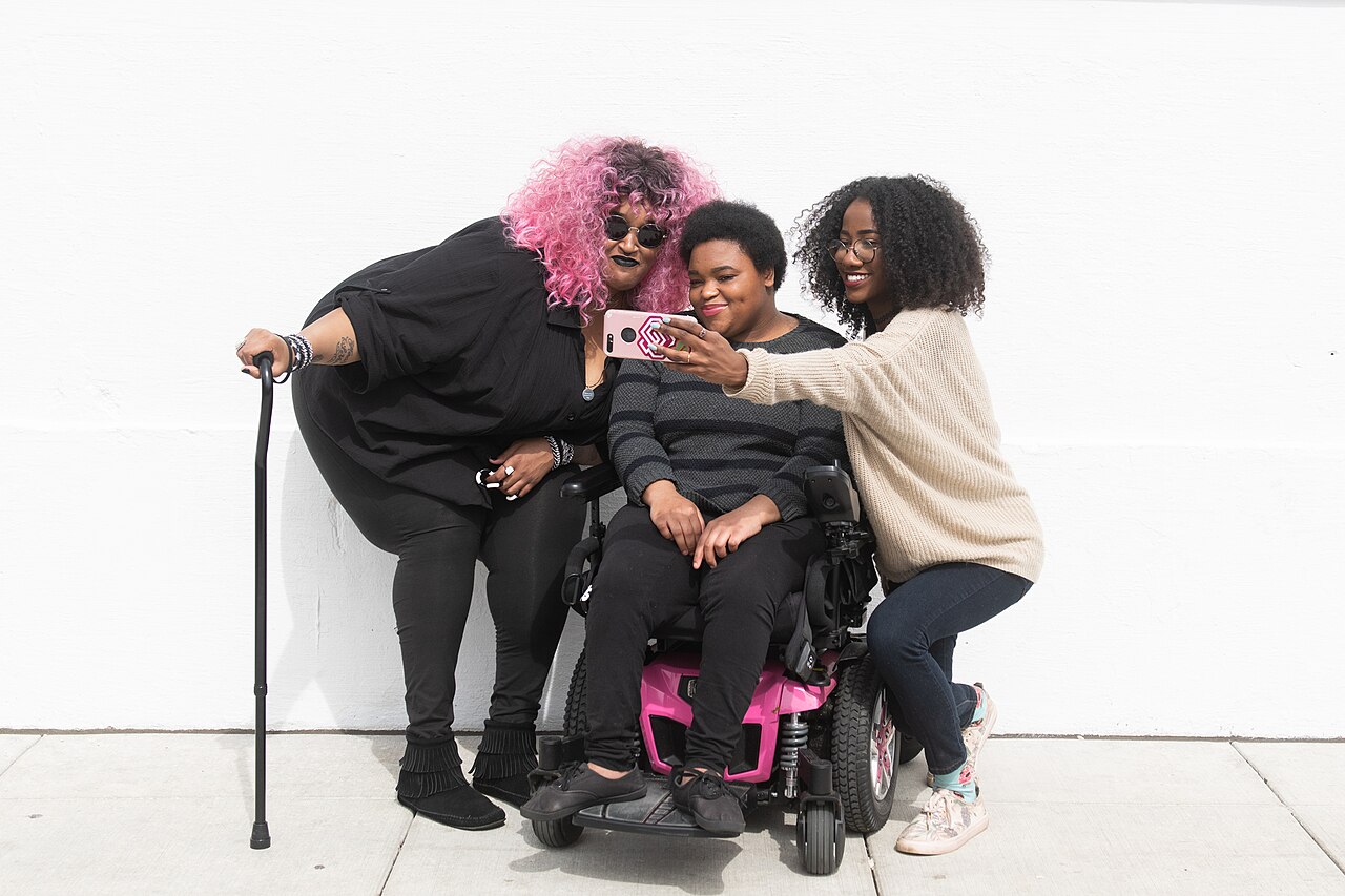 Disabled participants enjoying a social outing together